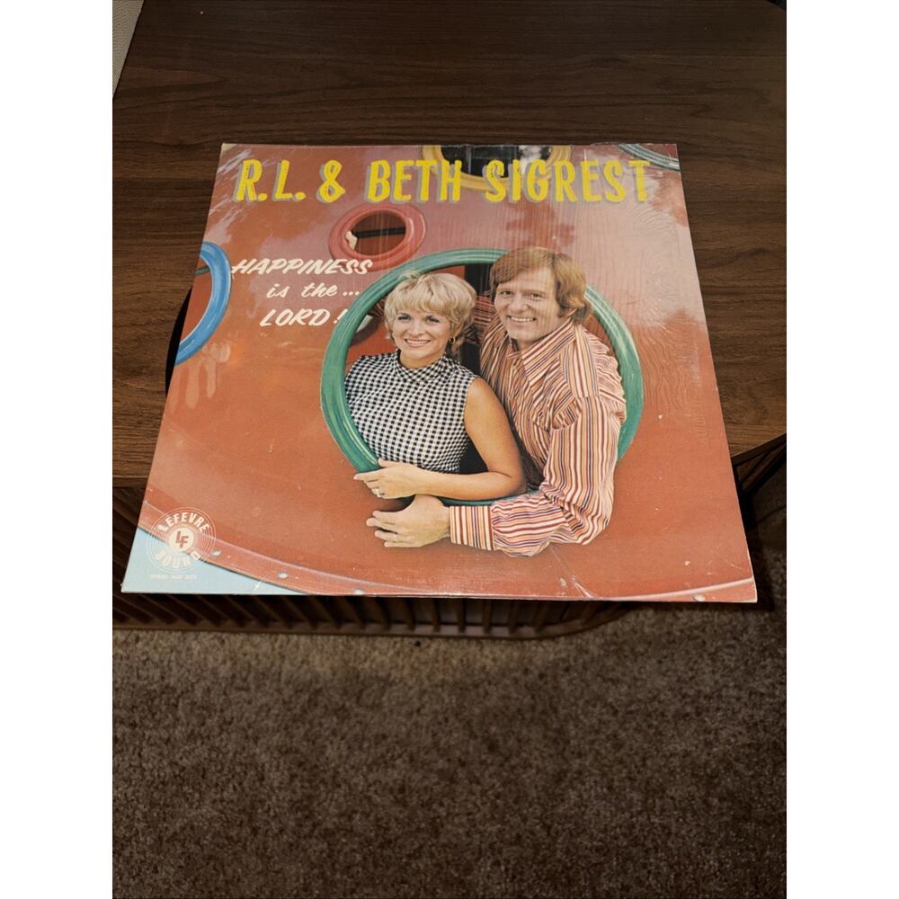 R.L. & Beth Sigrest - Happiness Is The Lord.